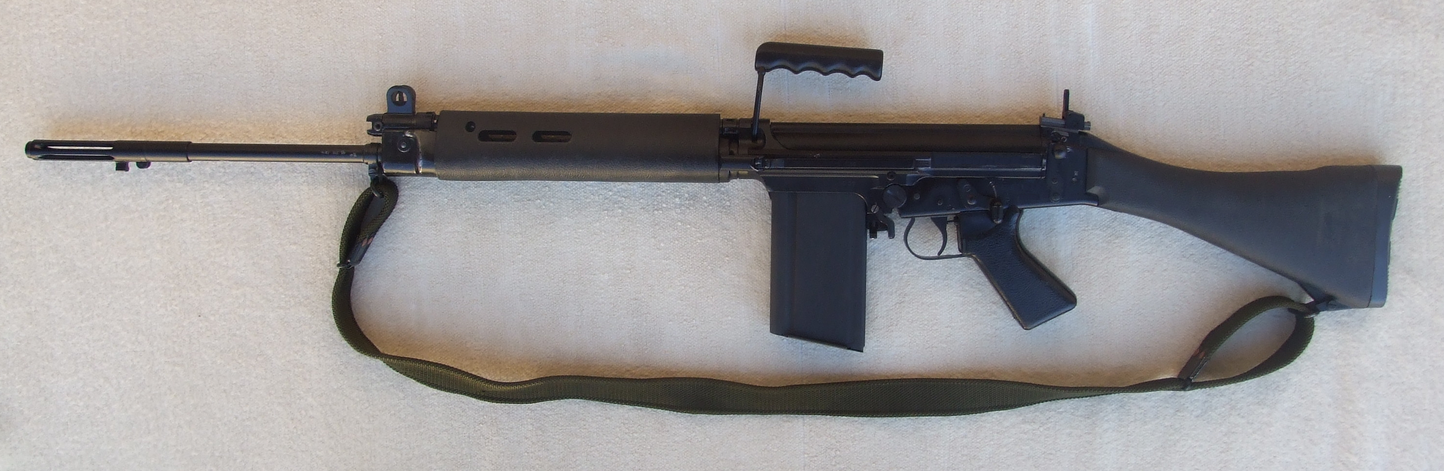      India Ordinance Factory Board (OFB)

India's old Semi-Automatic Battle-Rifle FN FAL 7.62mm .30Caliber (Belgium_FN), licensed manufactured in India 