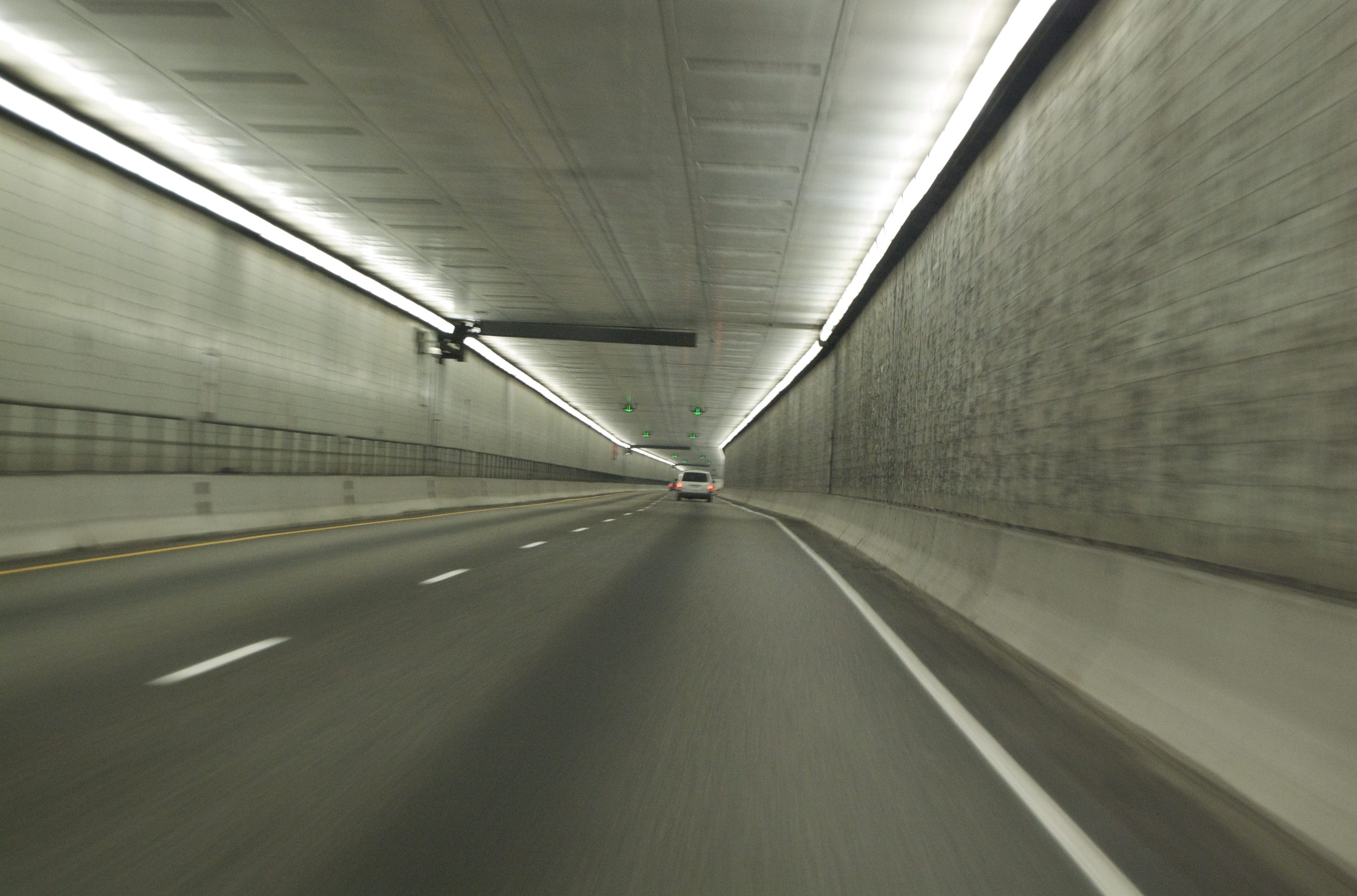  One-way,  2 lane traffic, inside the Eisenhower Tunnel in Colarado, USA 