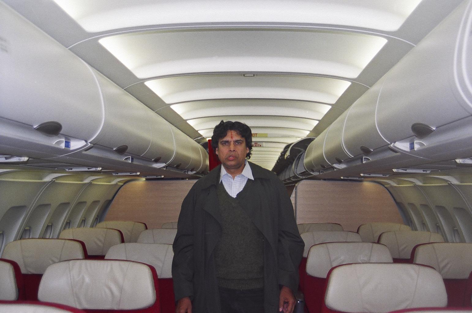 Myself in the Kingfisher Airlines Airbus-330; Tired & weary after the flight back to Calcutta from New Delhi