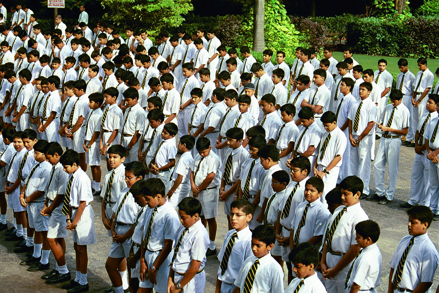 Students awaiting daily morning inspections, by the house prefects after Chapel