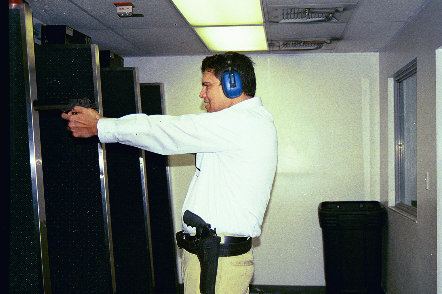 Myself, trying to shoot straight at the Gunrange (1999); CLICK TO ENLARGE